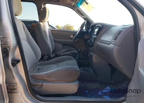 2002 Mazda Tribute Dx z USA, uszkodzony, nr VIN 4F2YU06B42KM34378